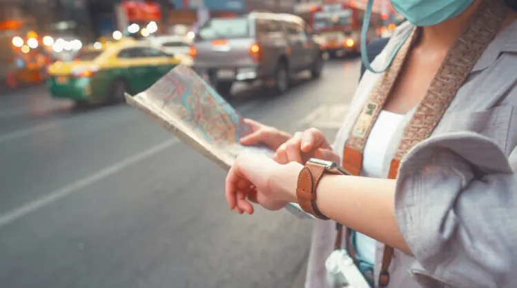 a woman looking at her watch in a traffic