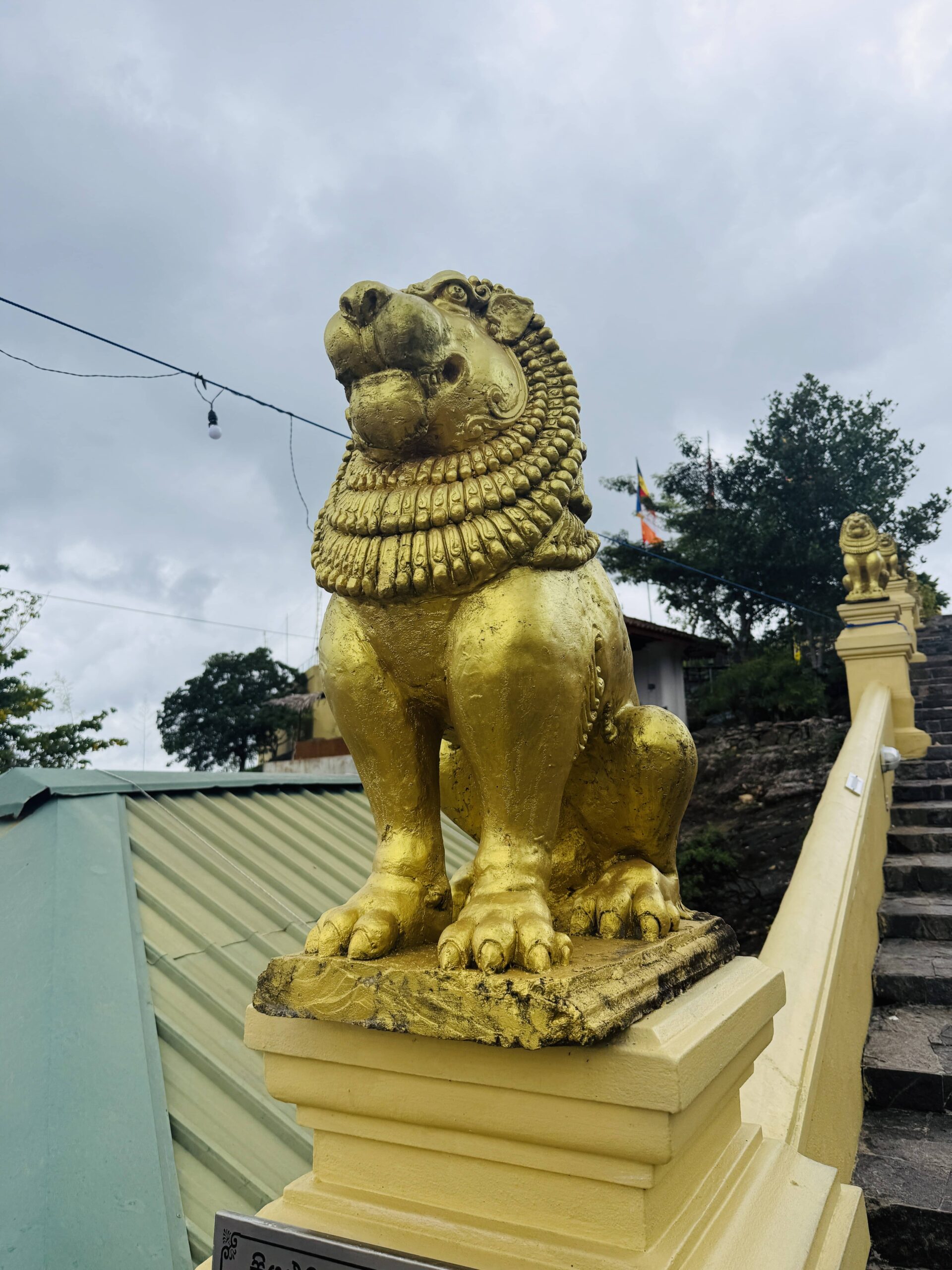 Nelligala International Buddhist Centre, Kandy: A Complete Visitor's Guide 14 One of the lion statues around the temple grounds