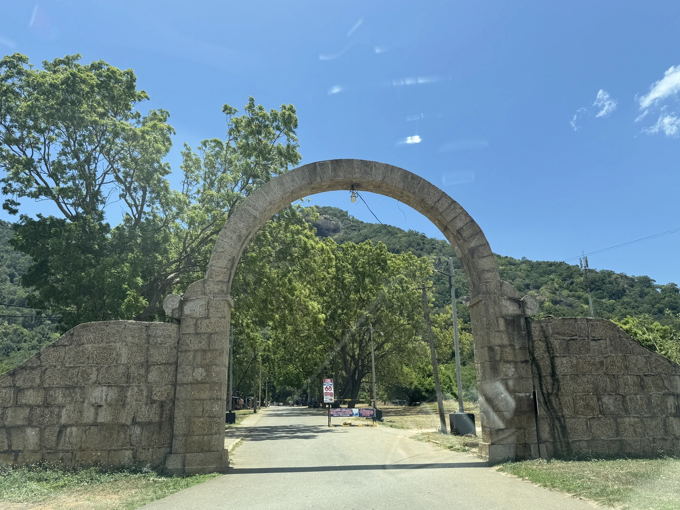03 getting there stone arch entrance road