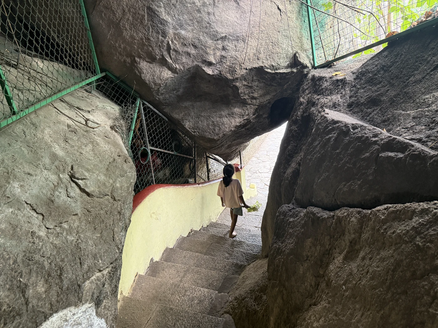 Stone steps between large boulders