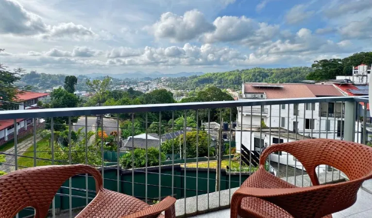 Balcony chairs overlooking Kandy city at 360 View Point by Queens Mount