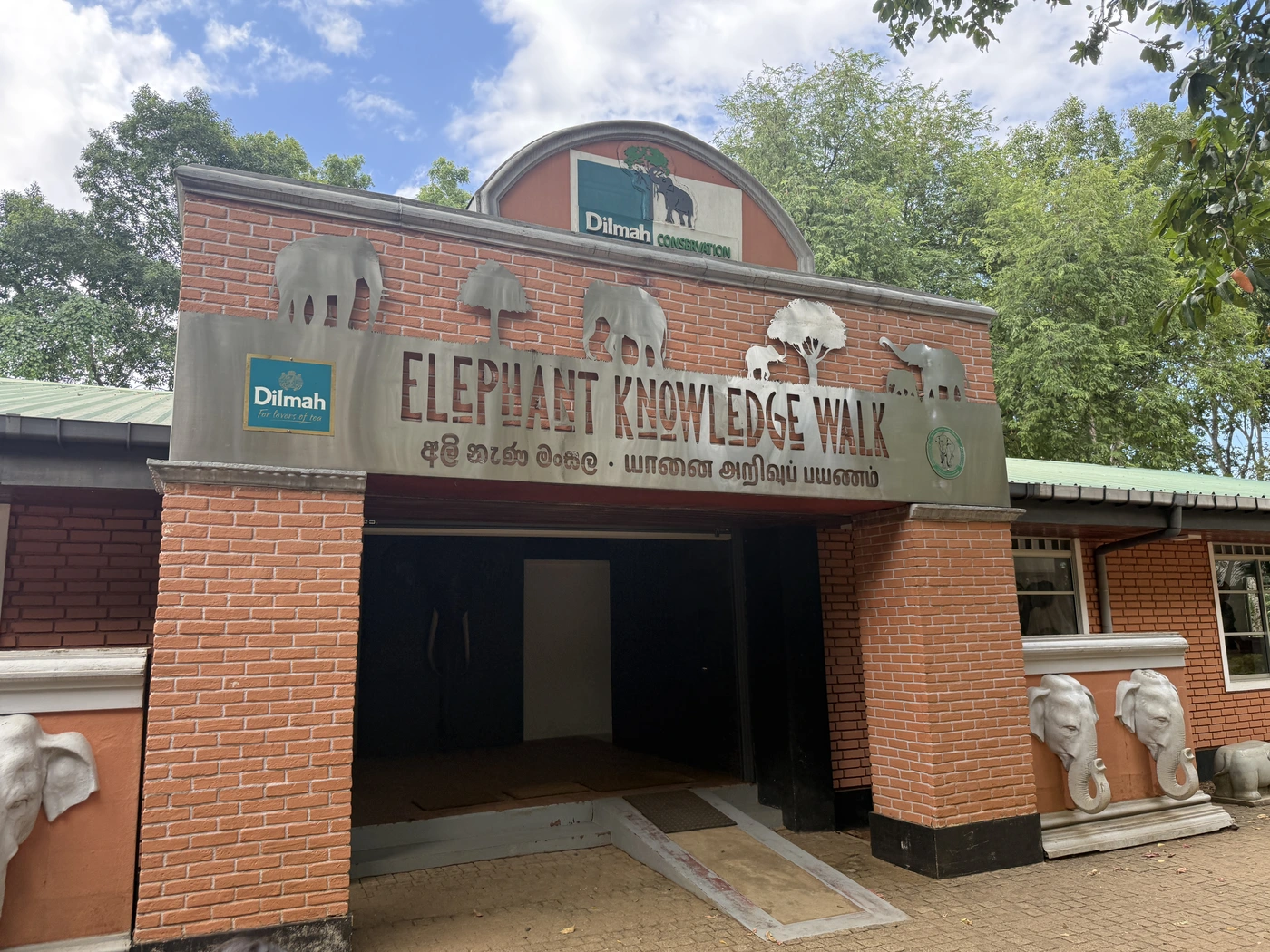 Brick entrance with Elephant Knowledge Walk sign
