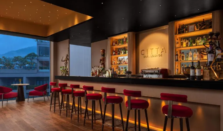 CITTA bar with red bar stools at The Golden Crown Hotel Kandy