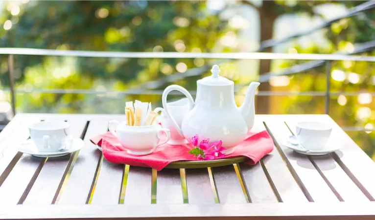 Tea set on a balcony table at Hotel Yo Kandy